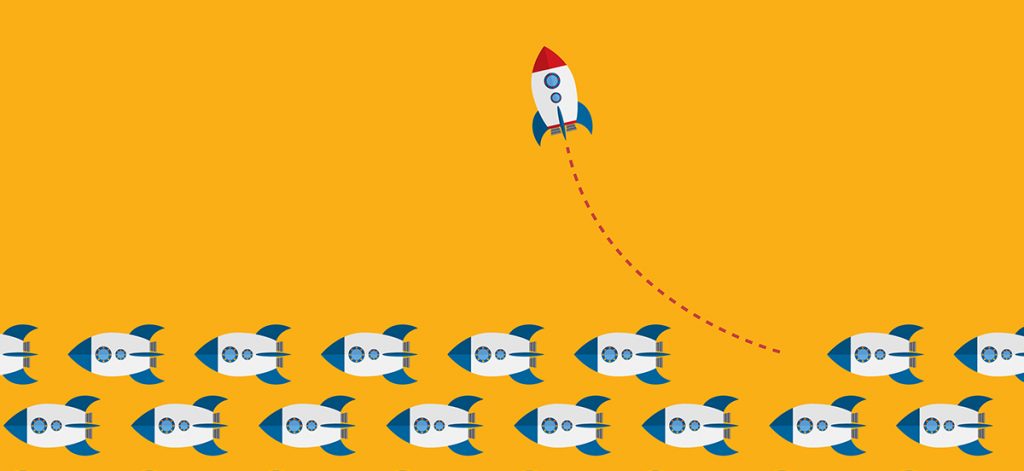 Colorful holiday real estate postcards displayed on a desk