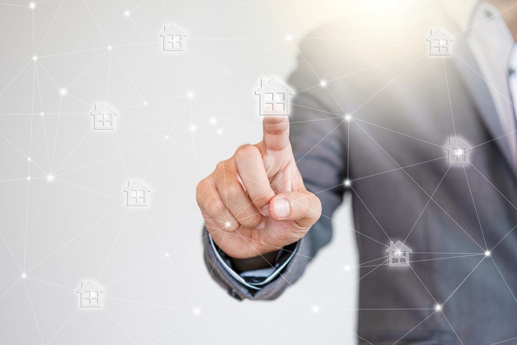 Real estate agent planning a marketing strategy with digital tools and data