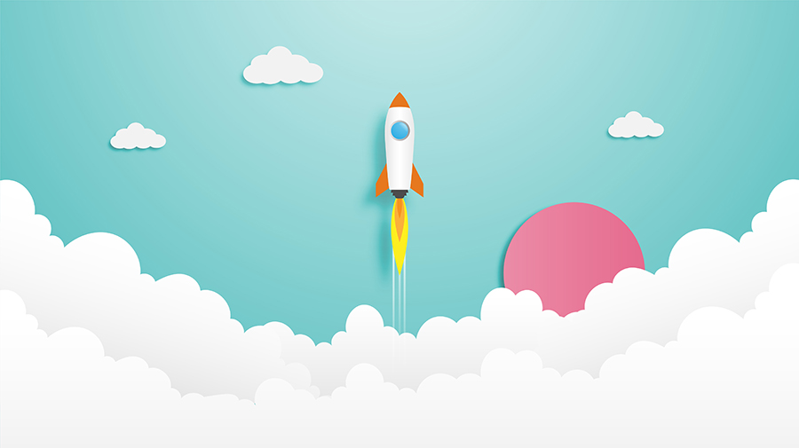 Real estate agent building an annual marketing plan with data and strategy documents