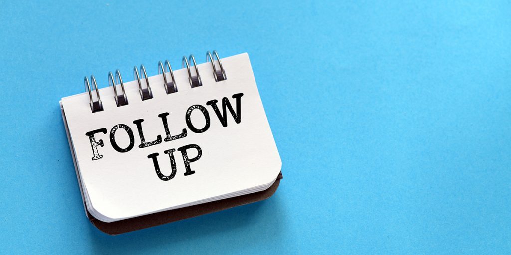 Real estate agent preparing safely before entering a property for a showing