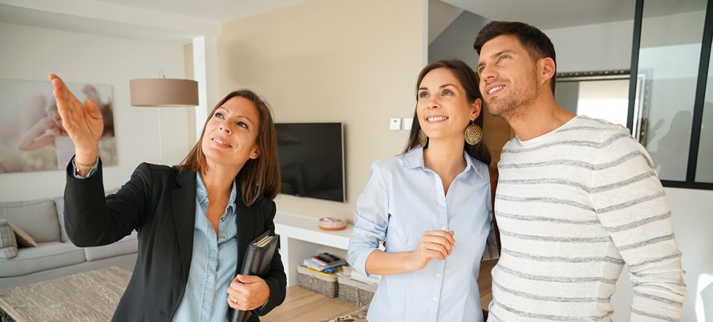 Real estate broker meeting with agents — team safety discussion